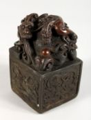A LARGE CHINESE SQUARE SHAPE DRAGON SEAL. 5.5ins high.