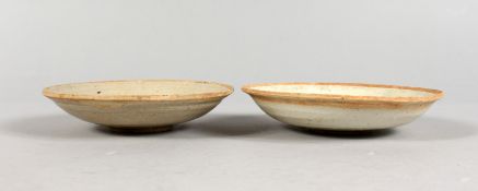 TWO EARLY CHINESE TERRACOTTA BOWLS.