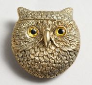 A GILDED OWL VESTA.