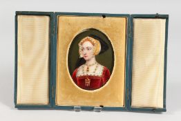 A GOOD PORCELAIN OVAL MINIATURE OF A LADY in a folding leather case. 4.25ins x 3ins.