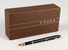 A CROSS PEN in original box.