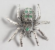 A SILVER AND PEARL ENAMELLED SPIDER BROOCH.