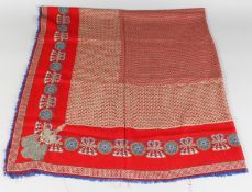 A VINTAGE CHANEL SILK SCARF, RED AND BLUE WITH TASSELS.