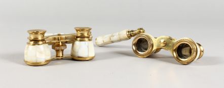A GOOD PAIR OF MOTHER-OF-PEARL OPERA GLASSES with handles. (2)