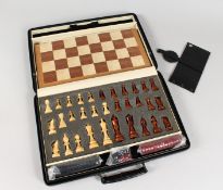 A BUGATTI LEATHER CASED CHESS SET.