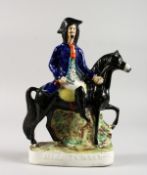 A STAFFORDSHIRE FIGURE DICK TURPIN. 11.5ins high.