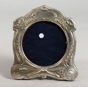 A SILVER ART NOUVEAU STYLE PHOTOGRAPH FRAME. 6ins x 5.25ins.