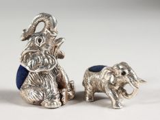 TWO SILVER ELEPHANT PIN CUSHIONS.