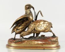 JULES MOIGNIEZ (1835-1894) FRENCH. A good small rouge patinated bronze of a pair of game birds