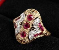 A 9CT GOLD, DIAMOND AND RUBY RING.