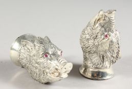 A PAIR OF .925 SILVER PLATE BOAR'S HEAD SALT AND PEPPERS.
