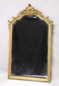 A GOOD 19TH CENTURY GILT FRAMED PIER MIRROR with shell, flowerhead and 