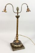 AN ORNATE BRASS AND MARBLE TWIN BRANCH TABLE LAMP with pineapple finial, barley twist column,