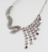 A SILVER RUBY, EMERALD, SAPPHIRE AND MARCASITE SNAKE NECKLACE.