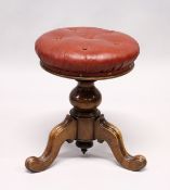 A VICTORIAN MAHOGANY CIRCULAR SWIVEL TOP PIANO STOOL with padded leather top.