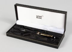 A MONT BLANC PEN in a box.