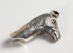 A NOVELTY SILVER HORSE'S HEAD WHISTLE.