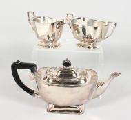A PLATED THREE PIECE TEA SERVICE of Art Deco design.