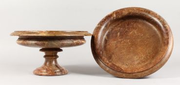 A GOOD PAIR OF MARBLE CIRCULAR URNS. 13ins diameter.