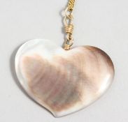 A VINTAGE DESIGNER RALPH MASSEY (born 1938) HEART and chain.