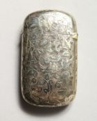 A VICTORIAN ENGRAVED SILVER VESTA. Maker: A. H. & Co.