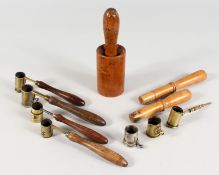 TEN PIECES OF CARTRIDGE MAKING EQUIPMENT.