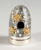A NOVELTY SILVER BEEHIVE PIN CUSHION.