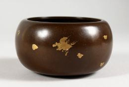 A CHINESE GOLD SPLASH CIRCULAR BRONZE CENSER. 4.5ins diameter.