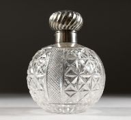A SILVER MOUNTED CUT GLASS SCENT BOTTLE, Chester 1907. 6ins high.
