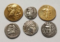 SIX GREEK COINS in a blue pouch.