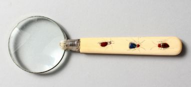A SMALL MAGNIFYING GLASS with shibayama handle.