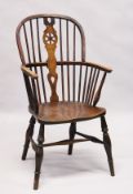 A 19TH CENTURY ASH AND ELM WHEEL BACK ARMCHAIR. 3ft 5ins high x 1ft 9ins wide.