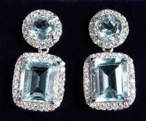A GOOD PAIR OF SILVER AND TOPAZ DROP EARRINGS.