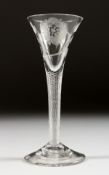 A VERY GOOD JACOBITE WINE GLASS, the trumpet bowl engraved with a rose and leaves, with an air twist