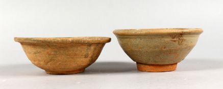 TWO EARLY CHINESE TERRACOTTA BOWLS.