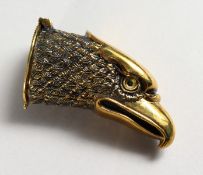 A BRASS AMERICAN EAGLE VESTA.