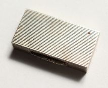 A REEDED SILVER SNUFF BOX. Birmingham 1954.