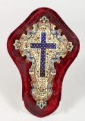 A CHAMPLEVE ENAMEL CROSS on a velvet background. 8ins long.