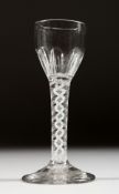 A GEORGIAN WINE GLASS with fluted bowl and white air twist stem. 5.25ins high.
