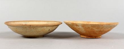 TWO EARLY CHINESE TERRACOTTA BOWLS.