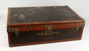 AN OLD LOUIS VIUTTON SUITCASE, with removable inner tray (handle detached). 28ins x 17.5ins x 8.