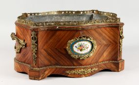 A 19TH CENTURY FRENCH KINGWOOD AND ORMOLU MOUNTED TWIN HANDLED JARDINIERE, of serpentine outline,