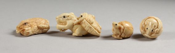 FOUR MINI CARVED BONE ANIMALS.