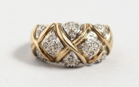 A 9CT YELLOW GOLD DIAMOND COSS HATCH RING.