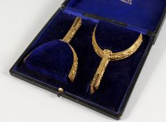 A PAIR OF GILT PRESENTATION SPURS, in a fitted case labelled MAXWELL, 8 DOVER STREET PICCADILLY W.