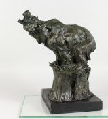 AN ABSTRACT FIGURE OF A ROARING BEAR, stood on a rock, mounted on a marble base. 15.5ins high.