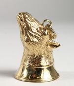 A GILDED HORSE'S HEAD SEAL.