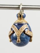 A RUSSIAN LAPIS LAZULI AND SILVER EGG SHAPE PENDANT.
