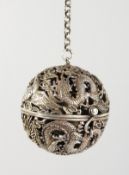 A CHINESE PIERCED SILVER BALL SHAPE CENSER. 2.25ins diameter.