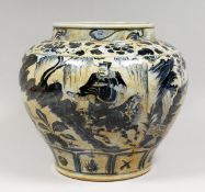 A CHINESE BLUE AND WHITE DECORATED PORCELAIN JARDINIERE. 12ins high.